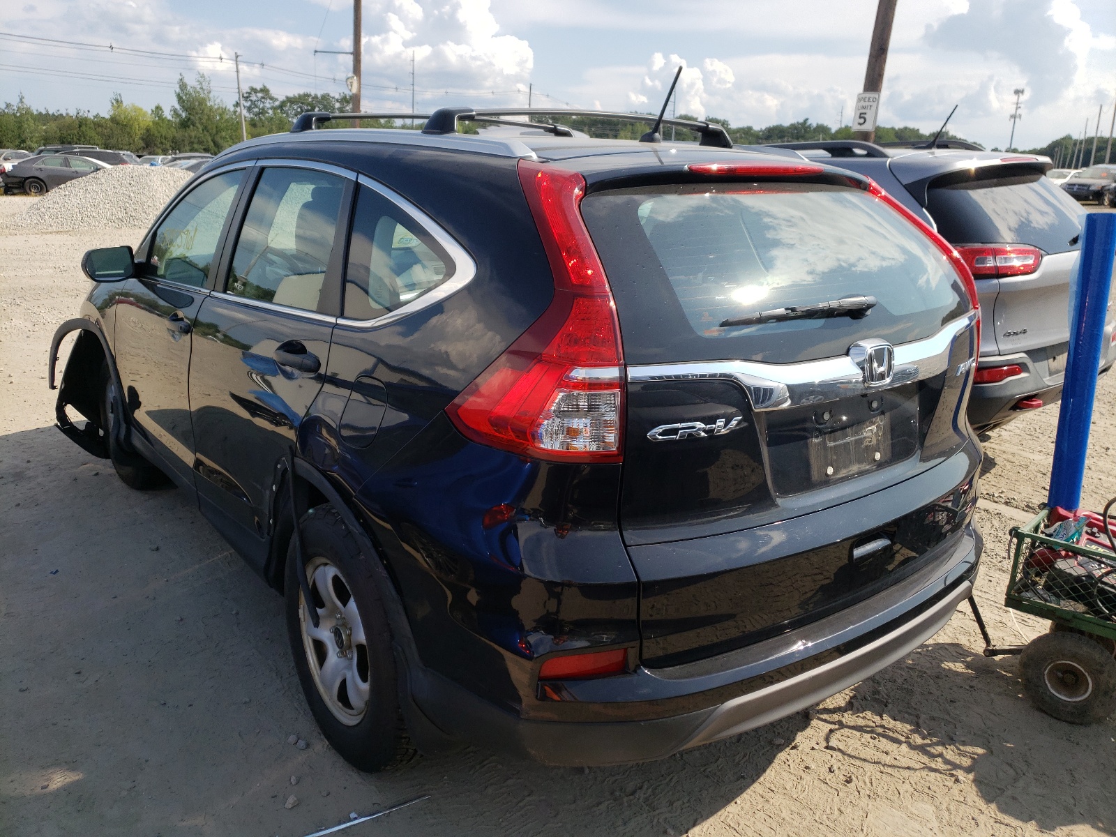 Photo 3 from auction – 2016 HONDA CR-V LX with VIN 5J6RM4H33GL087042
