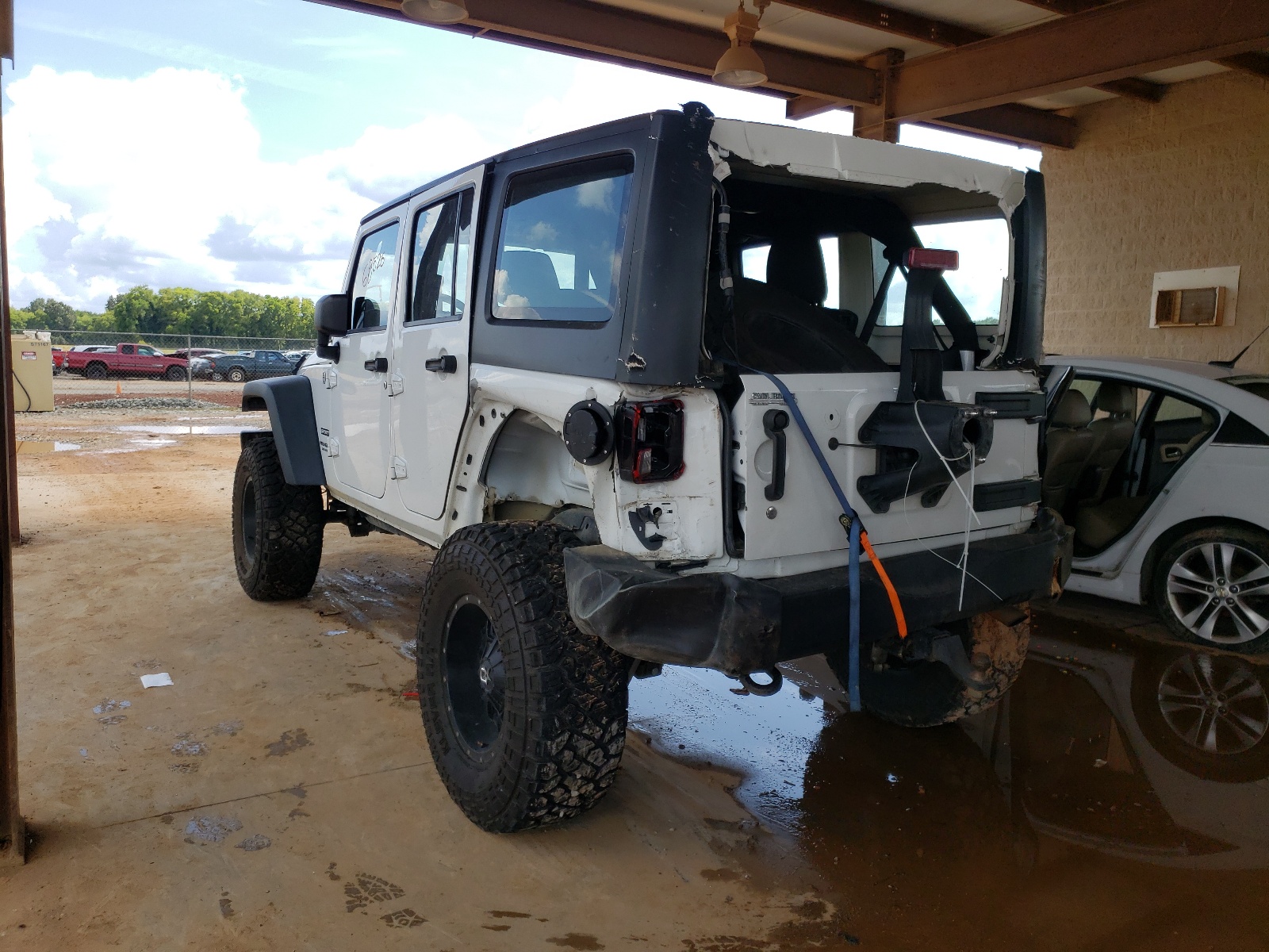 Photo 3 from auction – 2014 JEEP WRANGLER U with VIN 1C4BJWDG0EL178562