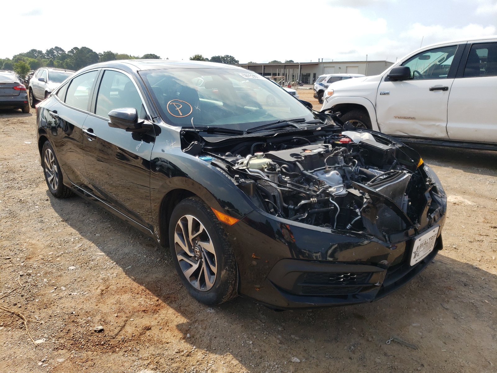 Photo 1 from auction – 2018 HONDA CIVIC EX with VIN 19XFC2F79JE003148