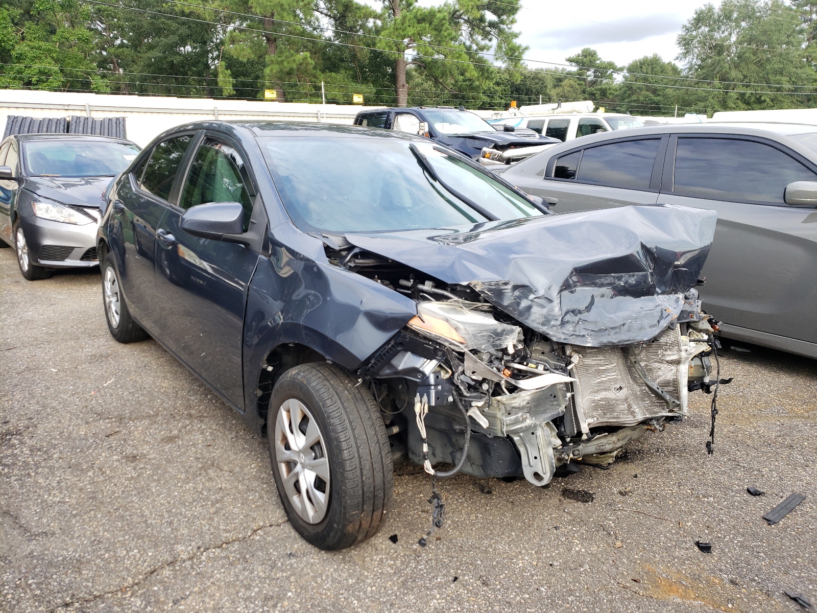 TOYOTA COROLLA L 2016 with VIN 2T1BURHE5GC698848 - Photo from auction
