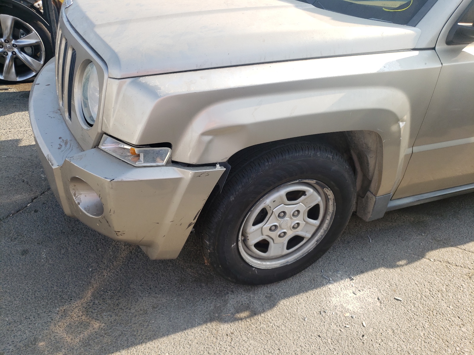 Photo 10 from auction – 2009 JEEP PATRIOT SP with VIN 1J4FT28B79D207682
