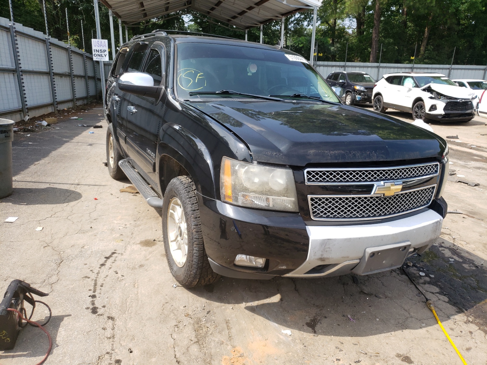 CHEVROLET TAHOE C150 2011 with VIN 1GNSCBE00BR103168 - Photo from auction
