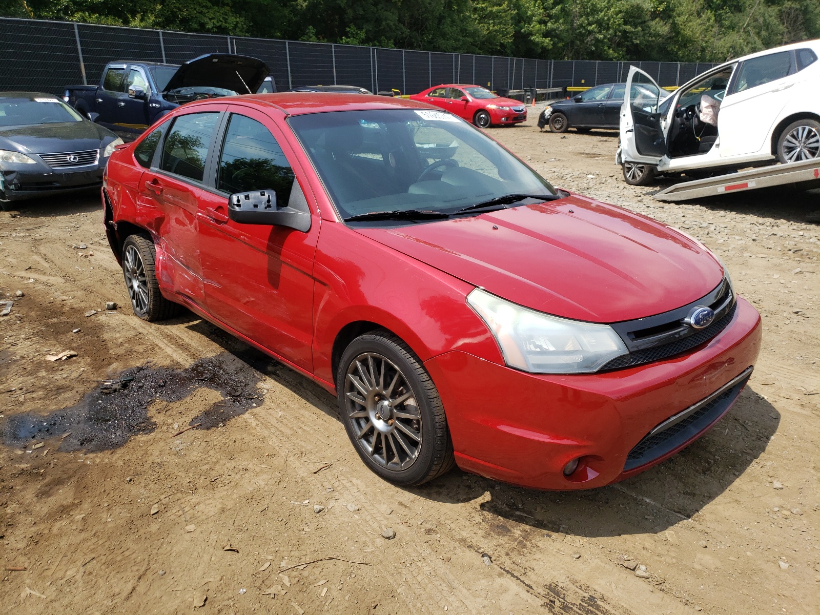 FORD FOCUS SES 2010 with VIN 1FAHP3GN9AW119882 - Photo from auction