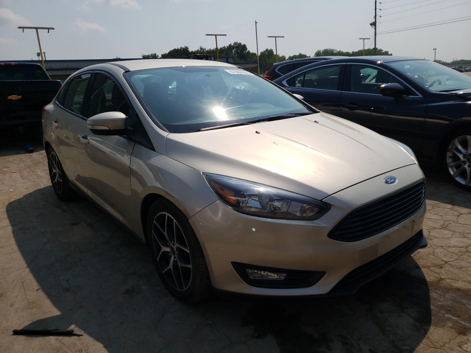 FORD FOCUS SE 2017 with VIN 1FADP3FE0HL292363 - Photo from auction
