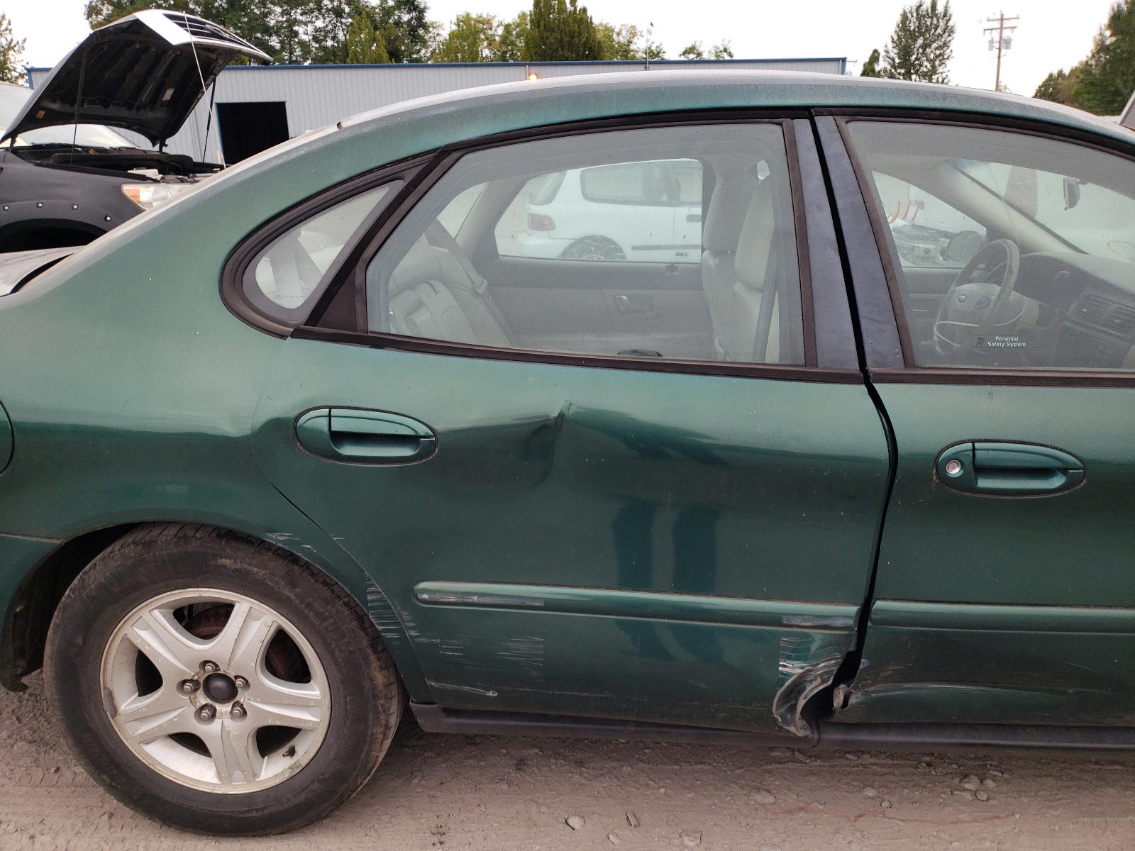 Photo 9 from auction – 2000 FORD TAURUS with VIN 1FAFP56S3YA125162