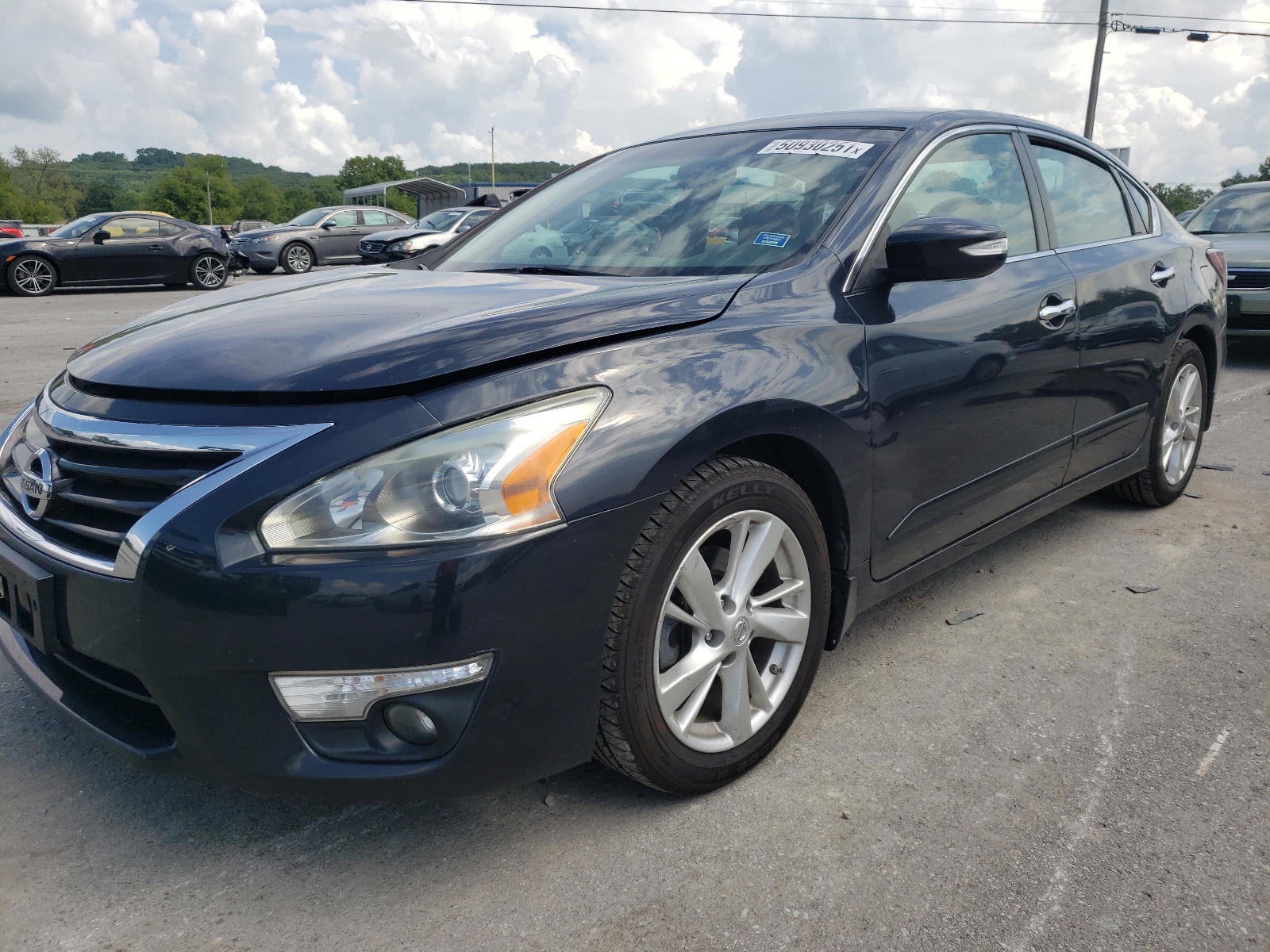 Photo 2 from auction – 2014 NISSAN ALTIMA 2.5 with VIN 1N4AL3AP1EC180335