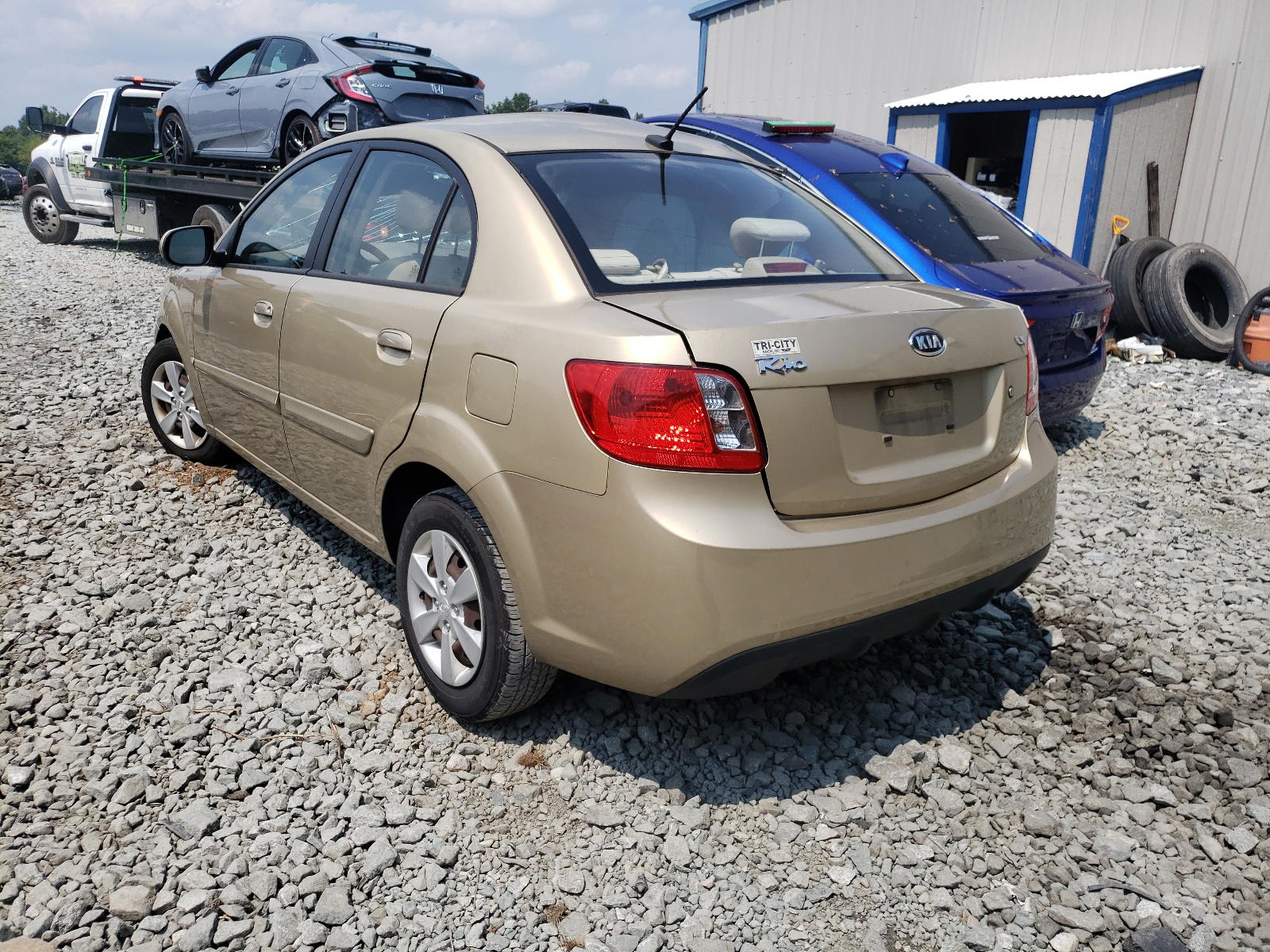 Photo 3 from auction – 2011 KIA RIO BASE with VIN KNADH4A35B6930614