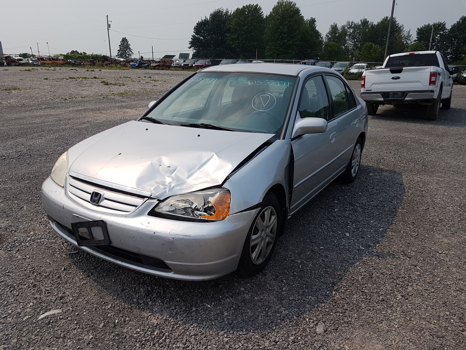Photo 2 from auction – 2003 HONDA CIVIC LX with VIN 2HGES166X3H923797