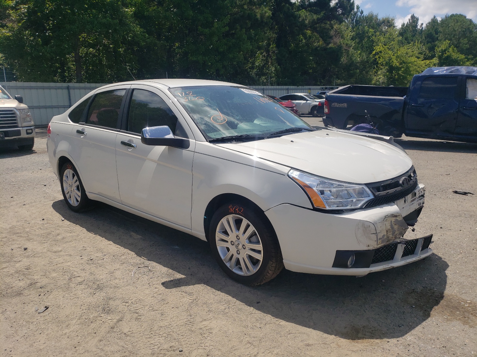 FORD FOCUS SEL 2010 with VIN 1FAHP3HN7AW163832 - Photo from auction