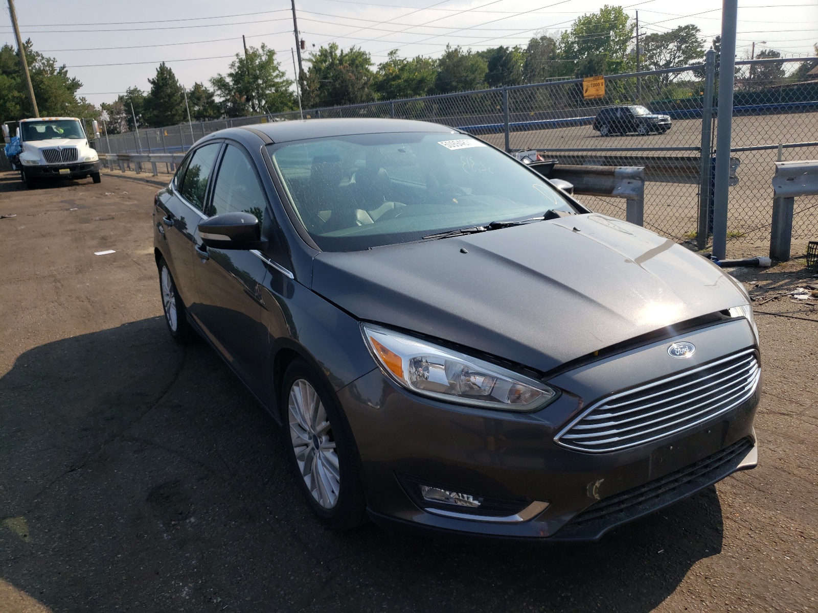 FORD FOCUS TITA 2016 with VIN 1FADP3J2XGL292060 - Photo from auction