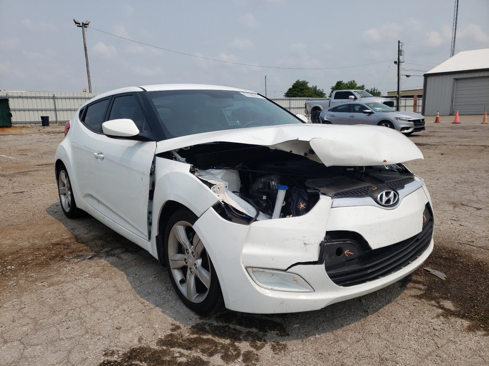 HYUNDAI VELOSTER 2012 with VIN KMHTC6ADXCU037056 - Photo from auction
