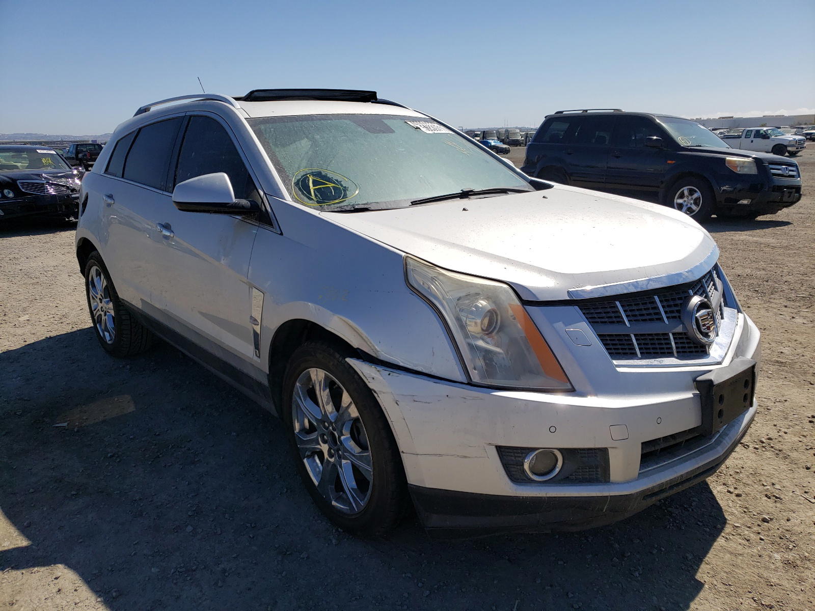 CADILLAC SRX PREMIU 2011 with VIN 3GYFNCEY1BS554343 - Photo from auction