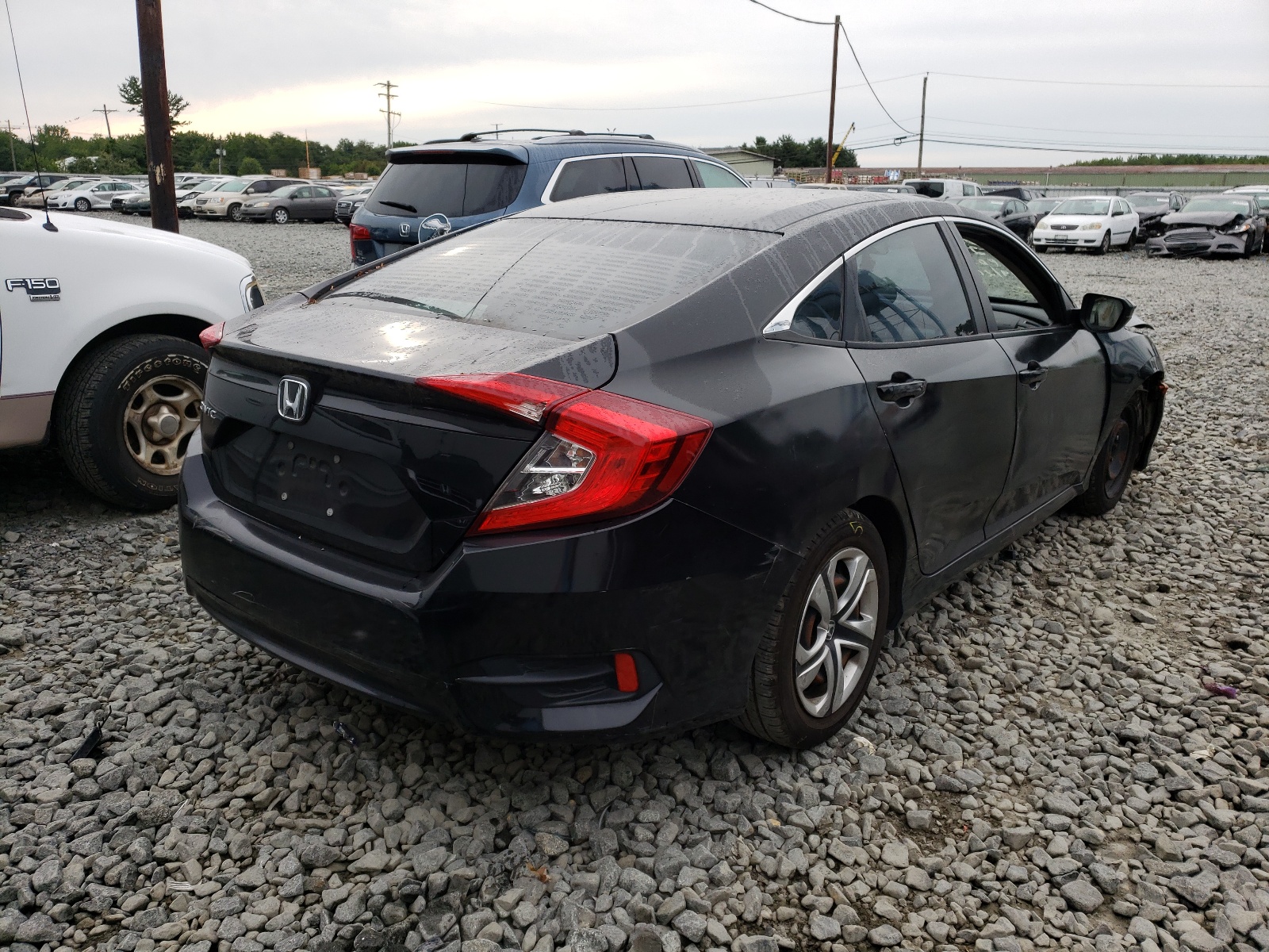 Photo 4 from auction – 2016 HONDA CIVIC LX with VIN 2HGFC2F58GH524262