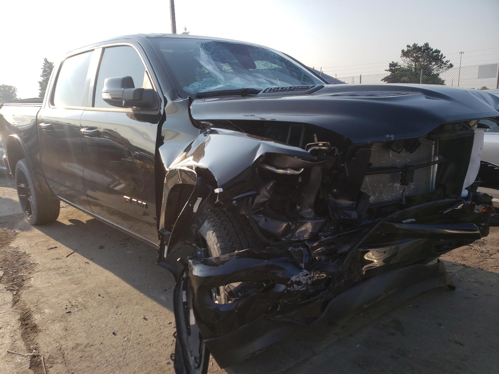 RAM 1500 LARAM 2020 with VIN 1C6SRFJT4LN308409 - Photo from auction