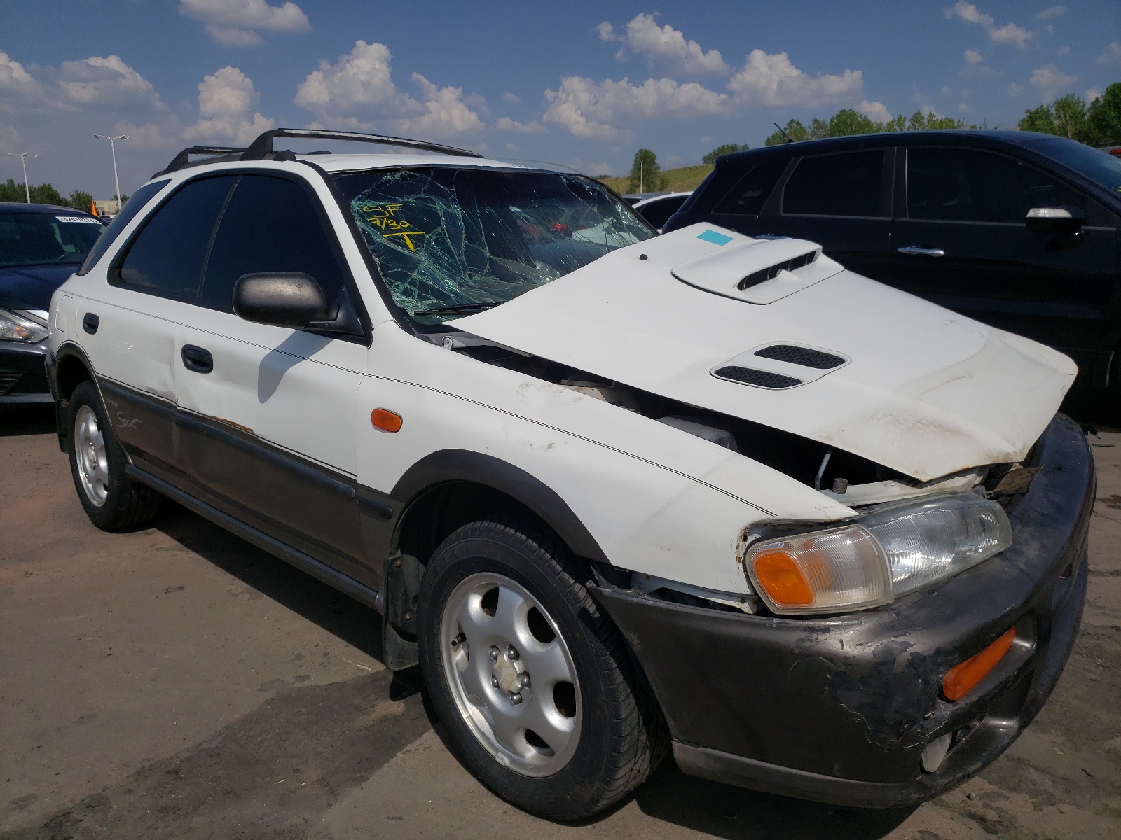 SUBARU IMPREZA OU 1998 with VIN JF1GF4854WH805584 - Photo from auction