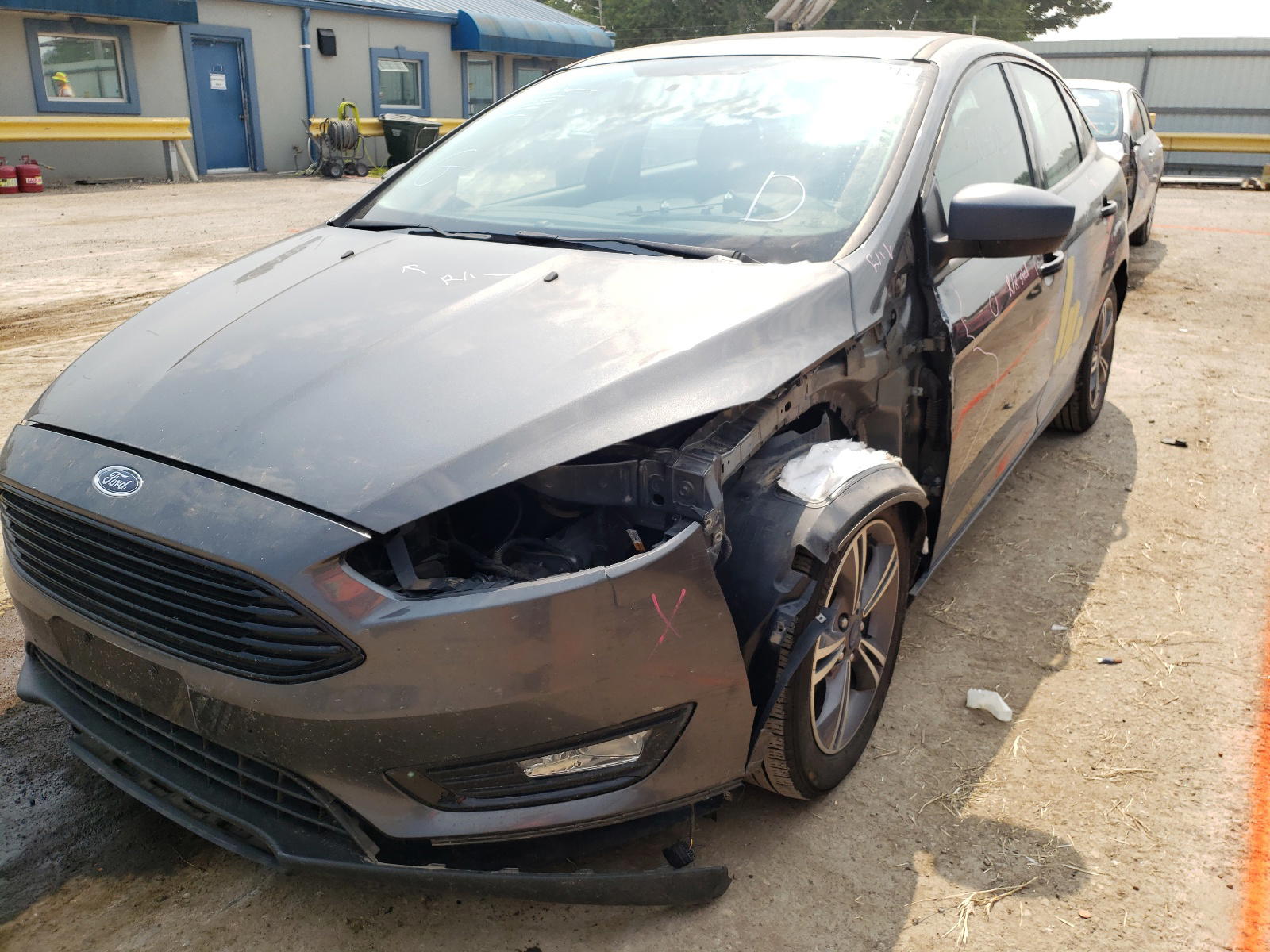 Photo 2 from auction – 2018 FORD FOCUS SE with VIN 1FADP3FE1JL204586