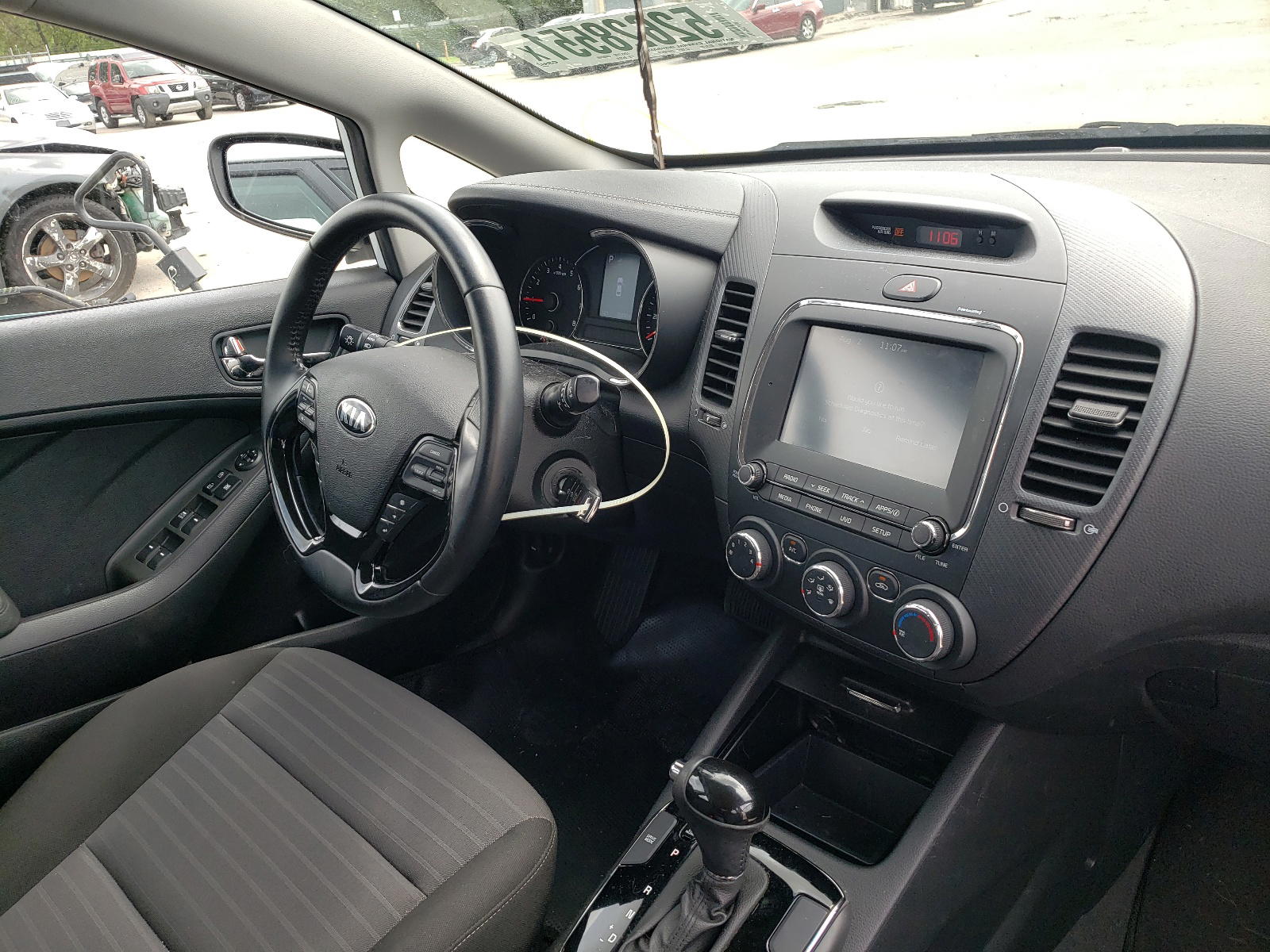 Photo 9 from auction – 2017 KIA FORTE LX with VIN 3KPFL4A79HE052010