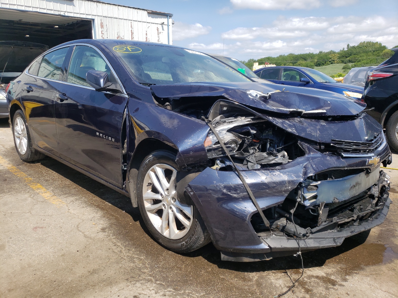 CHEVROLET MALIBU LT 2016 with VIN 1G1ZE5ST1GF210880 - Photo from auction