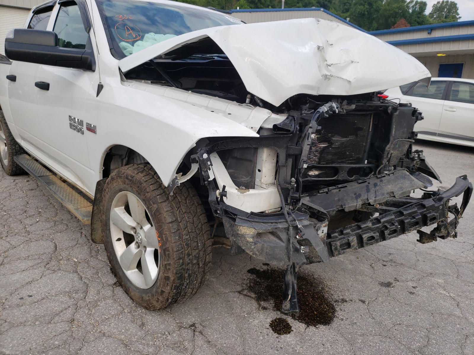 Photo 9 from auction – 2014 RAM 1500 ST with VIN 3C6RR7KTXEG324810
