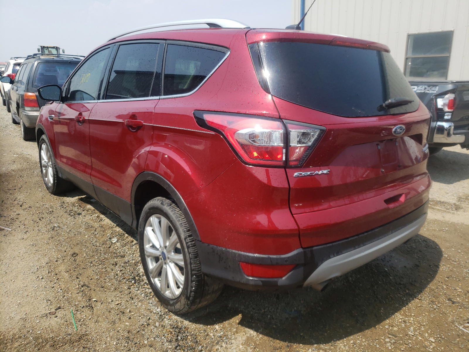 Photo 3 from auction – 2017 FORD ESCAPE TIT with VIN 1FMCU0J99HUD12347