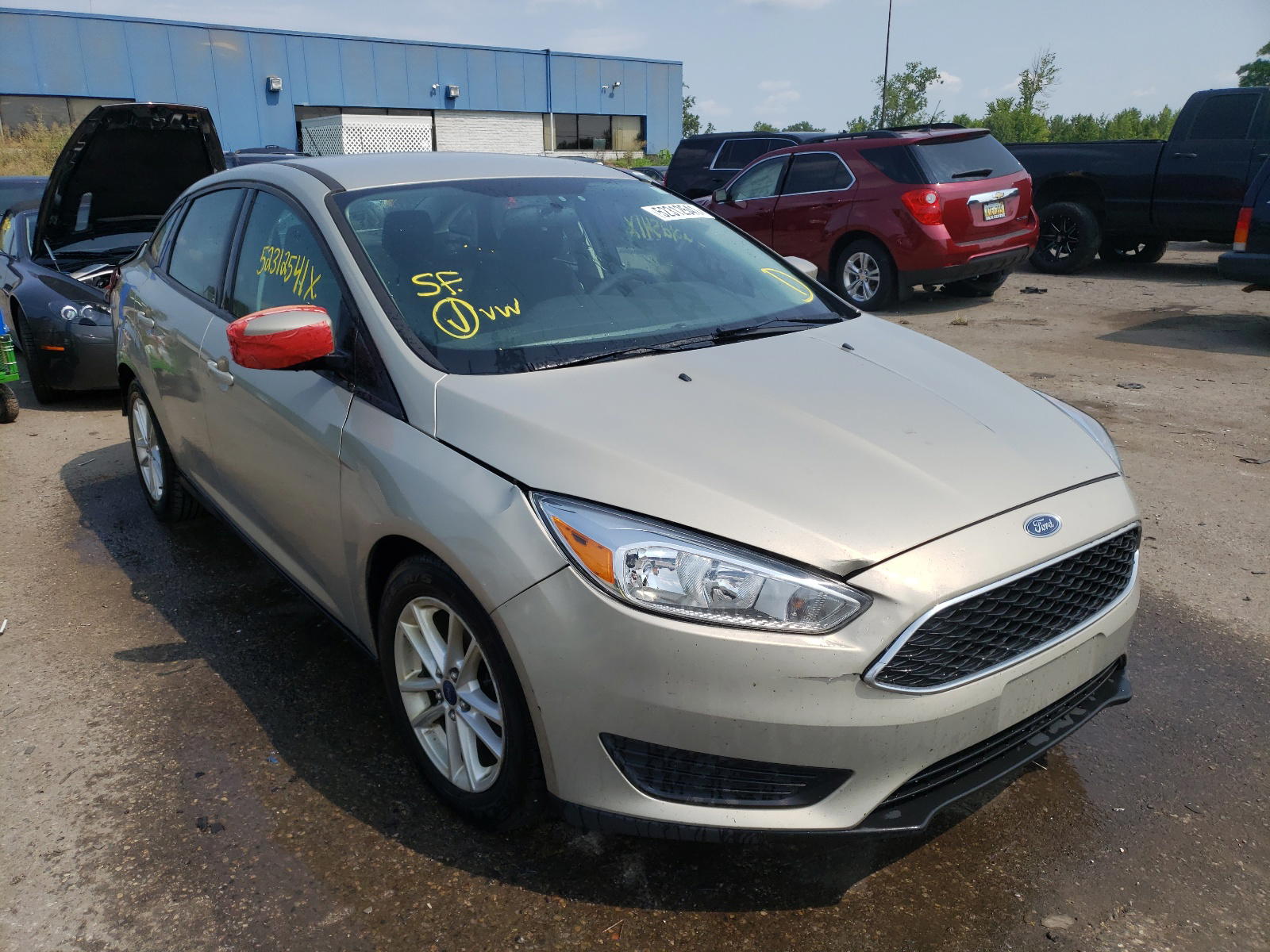 FORD FOCUS SE 2015 with VIN 1FADP3F20FL384351 - Photo from auction