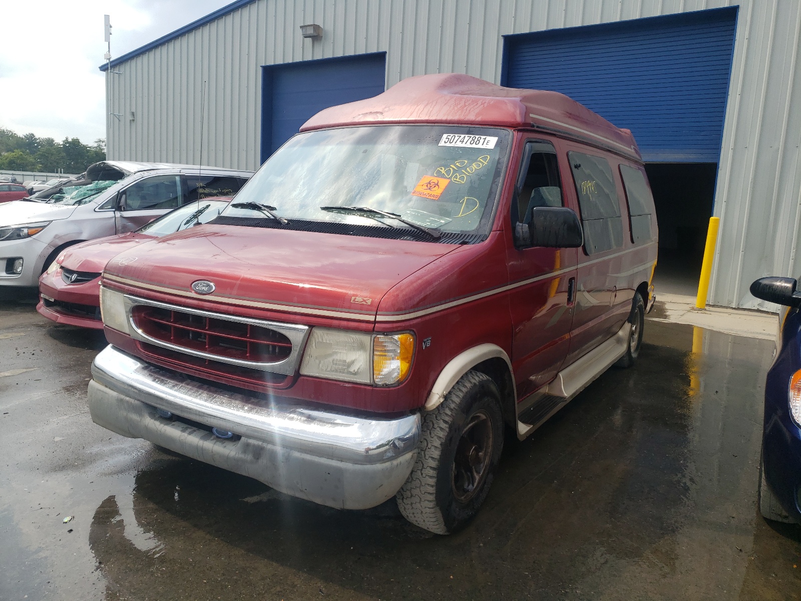 Photo 2 from auction – 1999 FORD ECONOLINE with VIN 1FDRE14L0XHC10642