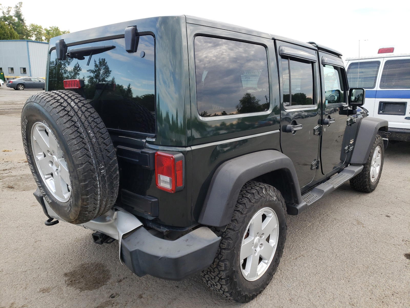 Photo 4 from auction – 2011 JEEP WRANGLER U with VIN 1J4BA5H10BL629107