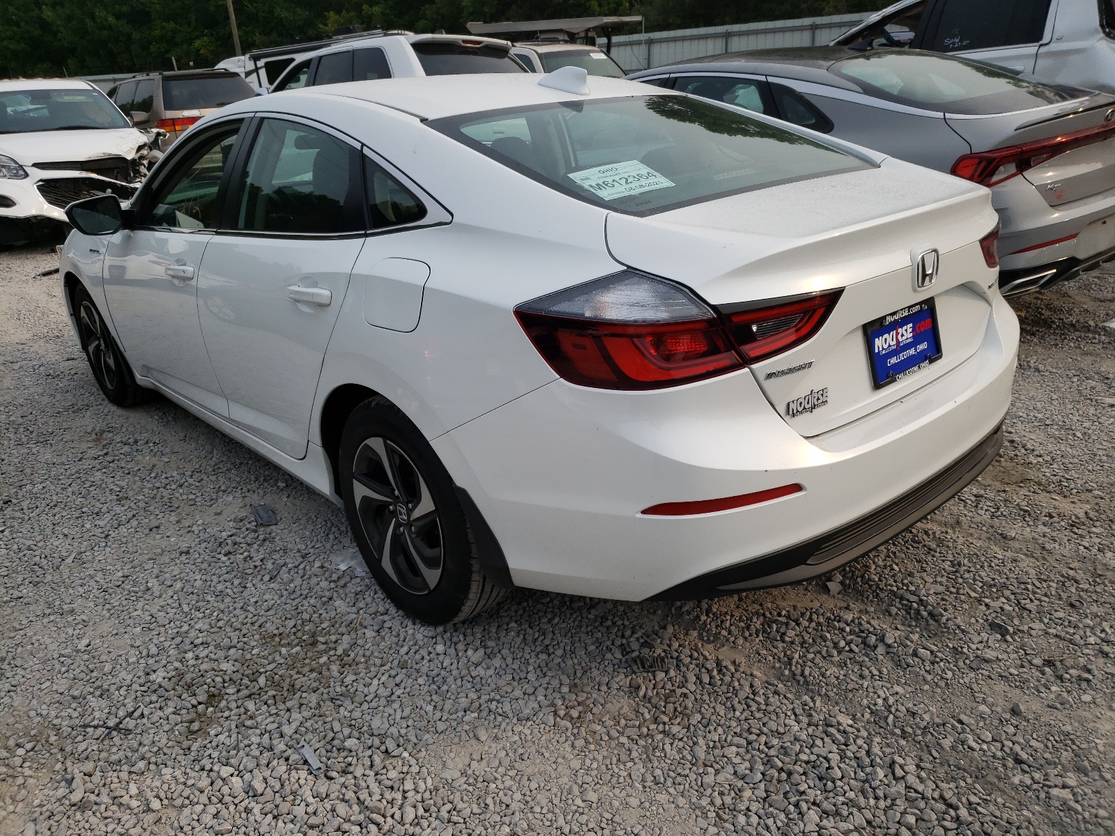 Photo 3 from auction – 2021 HONDA INSIGHT EX with VIN 19XZE4F52ME010111