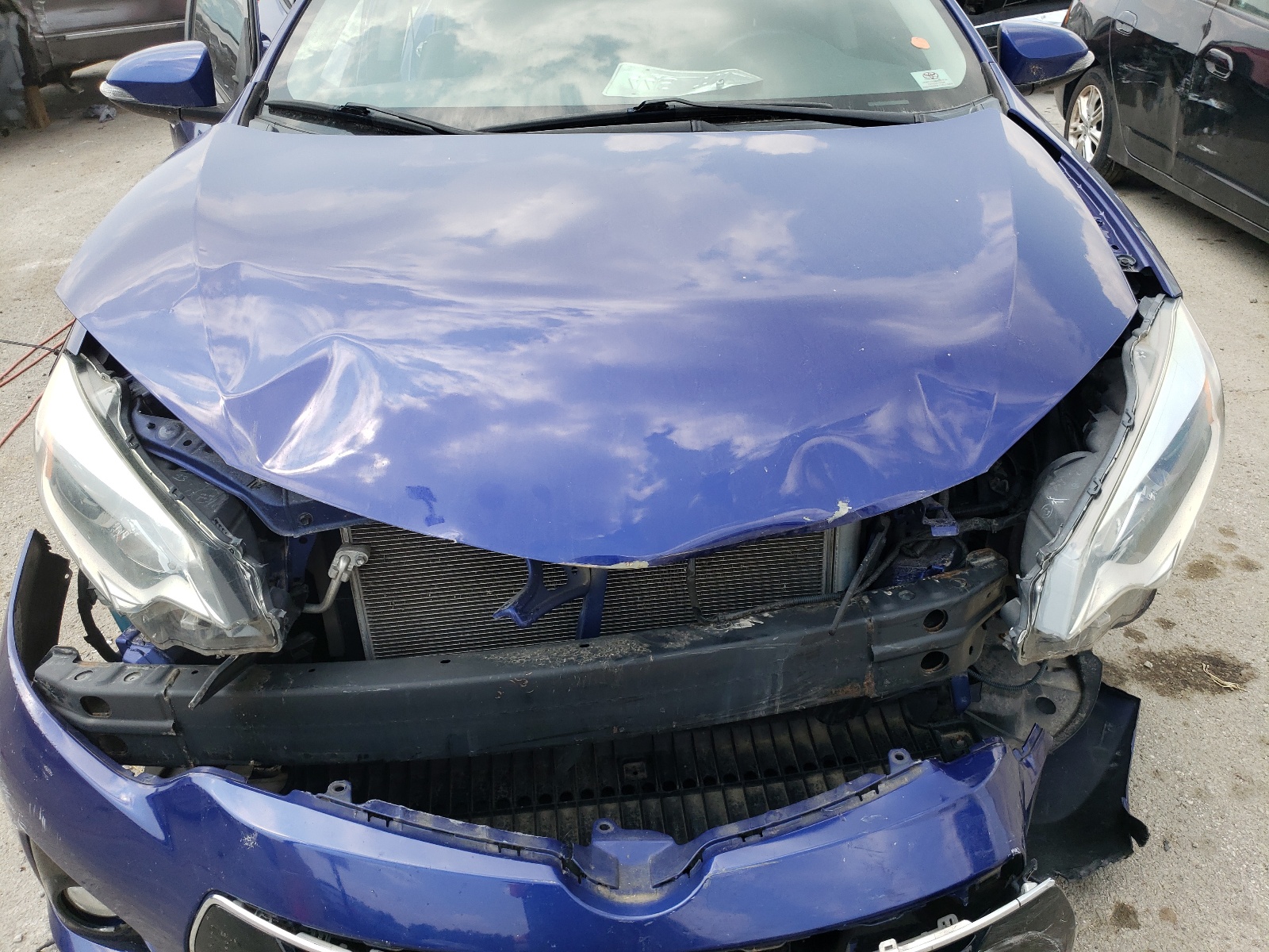 Photo 7 from auction – 2014 TOYOTA COROLLA L with VIN 2T1BURHE5EC036104