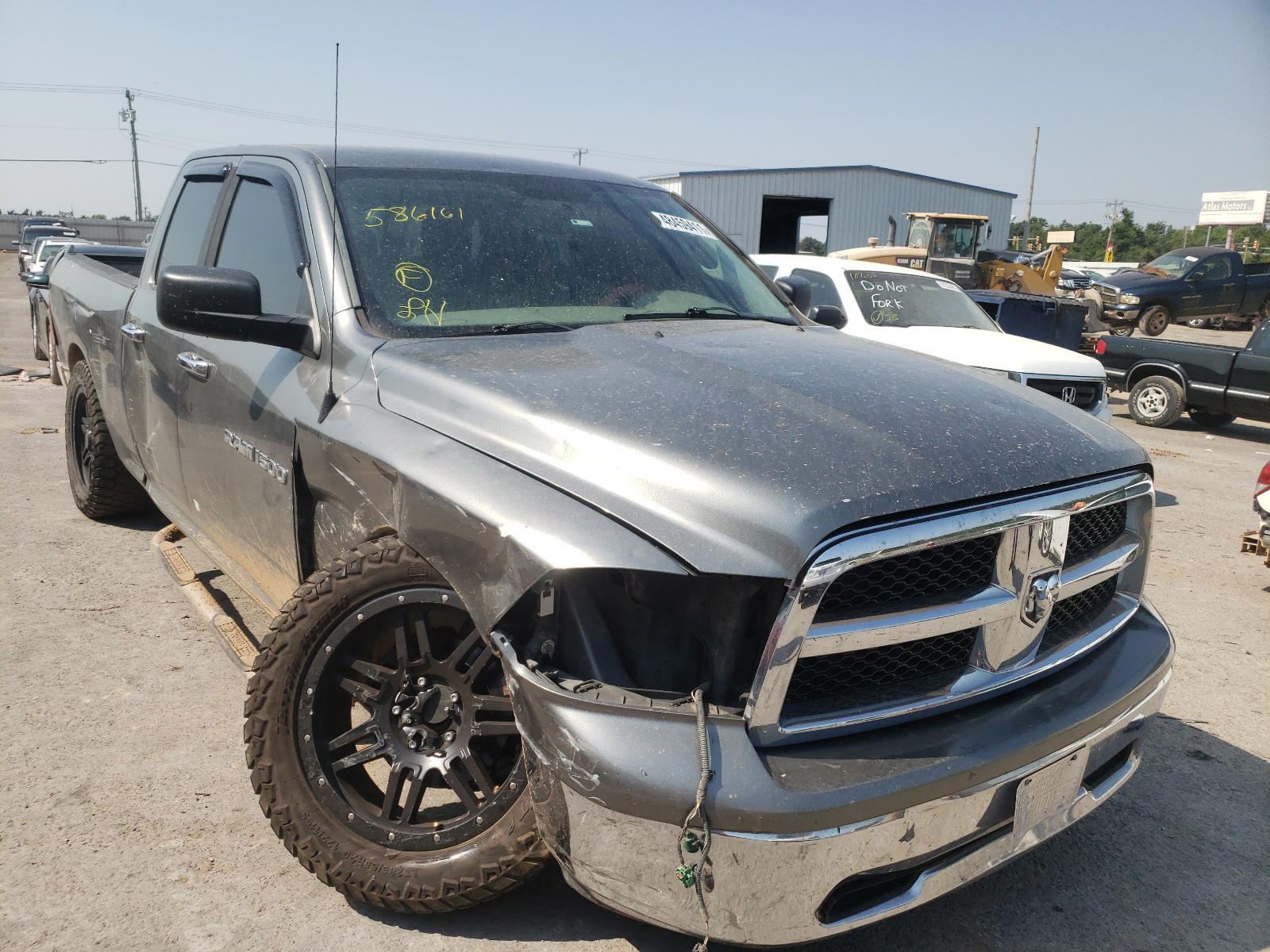 DODGE RAM 1500 2011 with VIN 1D7RB1GP4BS586161 - Photo from auction