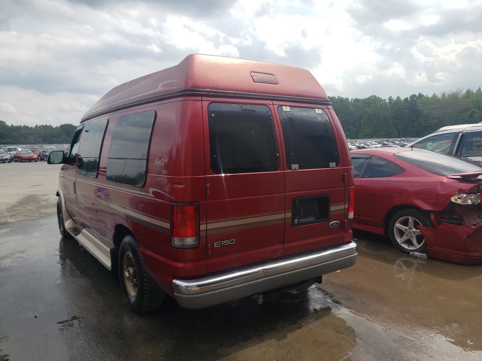 Photo 3 from auction – 1999 FORD ECONOLINE with VIN 1FDRE14L0XHC10642