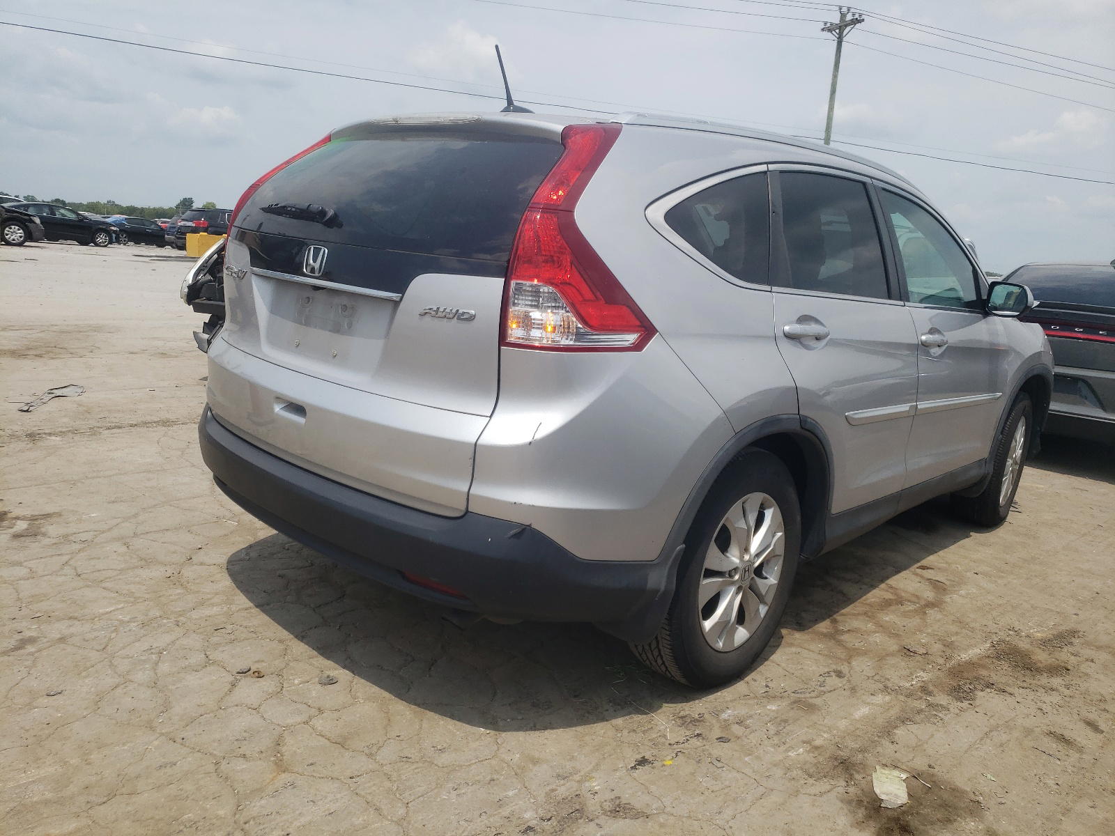 Photo 4 from auction – 2012 HONDA CR-V EXL with VIN 5J6RM4H75CL015269