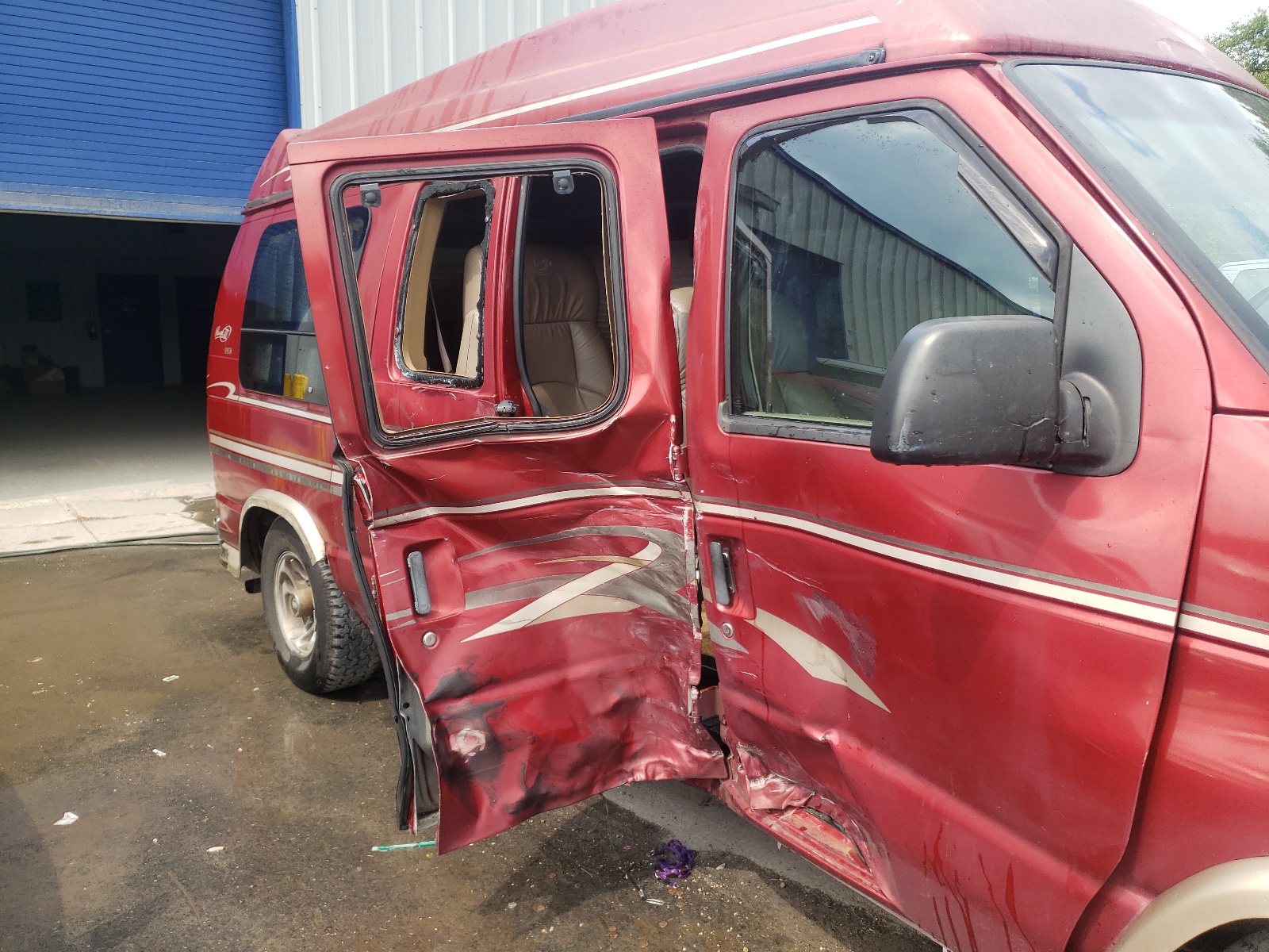 Photo 9 from auction – 1999 FORD ECONOLINE with VIN 1FDRE14L0XHC10642