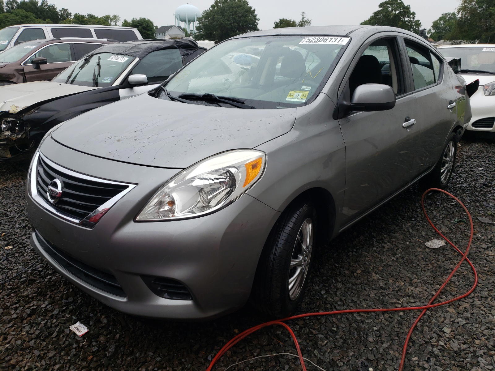 Photo 2 from auction – 2012 NISSAN VERSA S with VIN 3N1CN7AP8CL854022