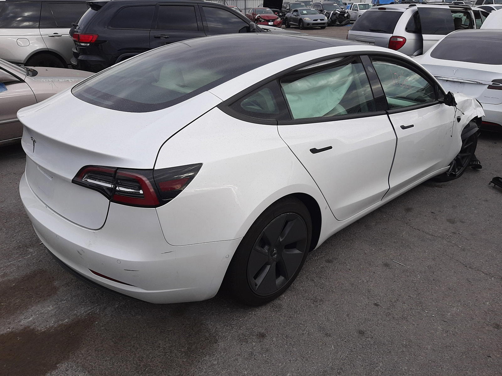 Photo 4 from auction – 2021 TESLA MODEL 3 with VIN 5YJ3E1EA1MF921592