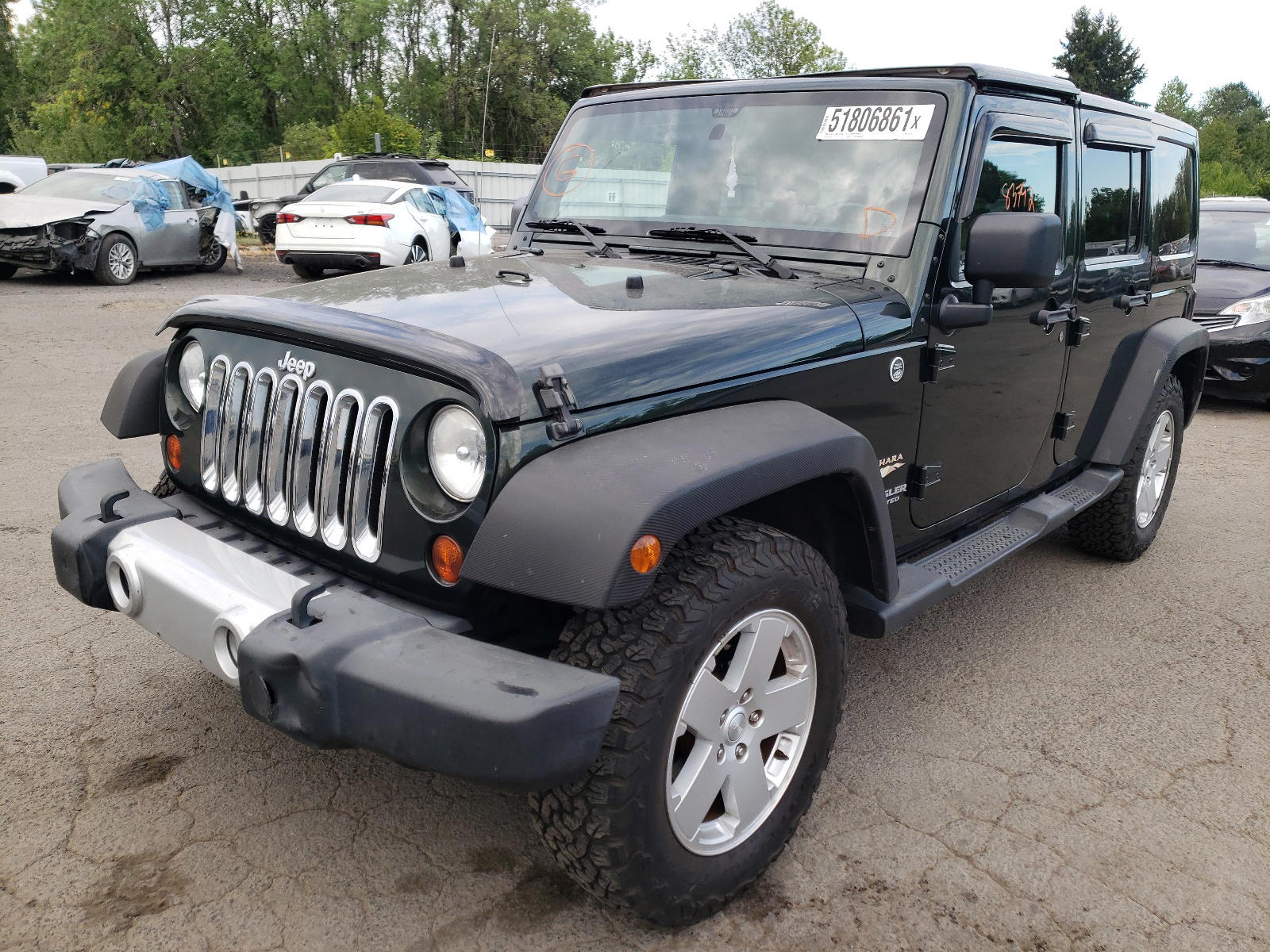 Photo 2 from auction – 2011 JEEP WRANGLER U with VIN 1J4BA5H10BL629107