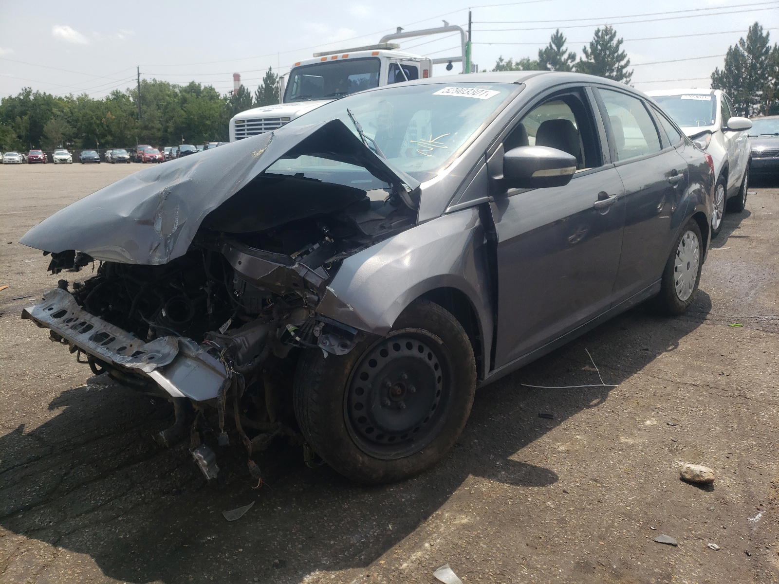Photo 2 from auction – 2014 FORD FOCUS SE with VIN 1FADP3F24EL351352