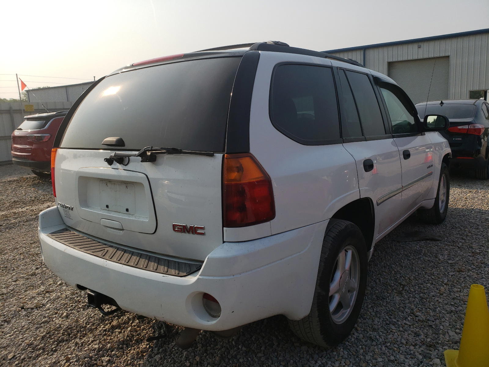 Photo 4 from auction – 2006 GMC ENVOY with VIN 1GKDT13S962156728
