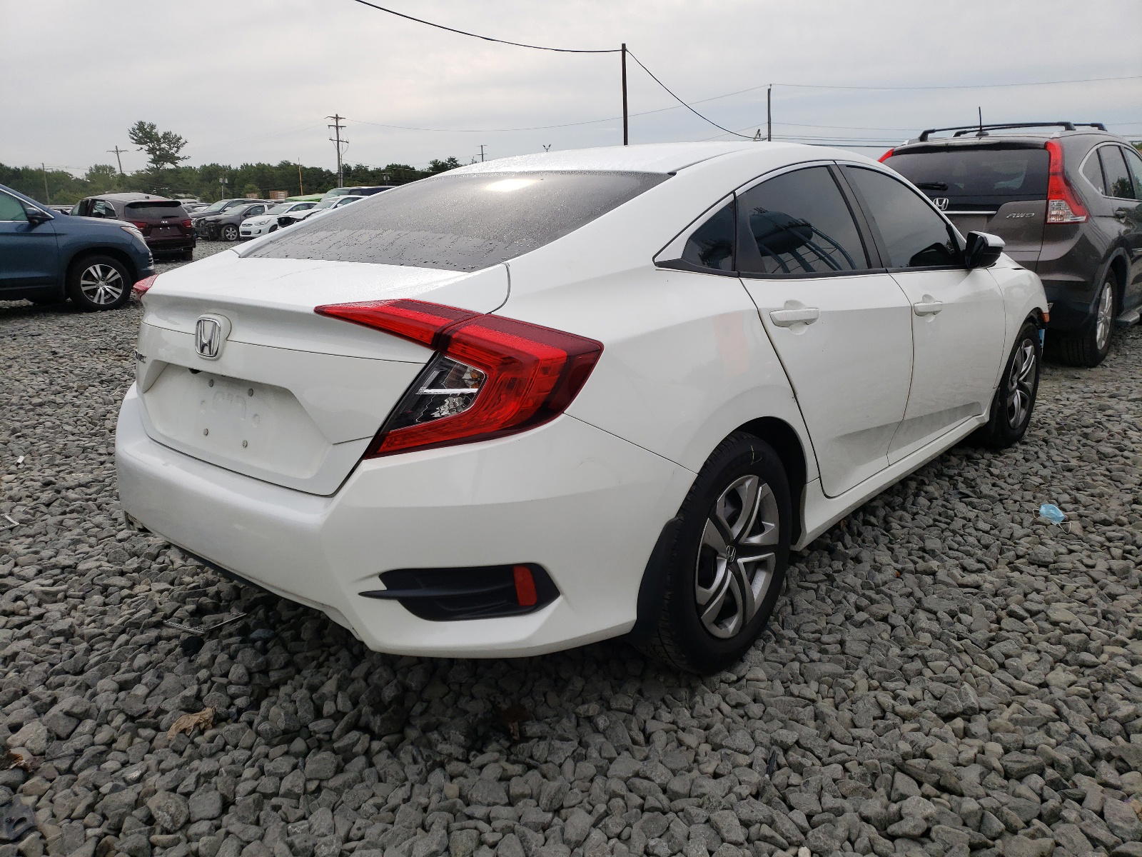 Photo 4 from auction – 2016 HONDA CIVIC LX with VIN 19XFC2F59GE218844