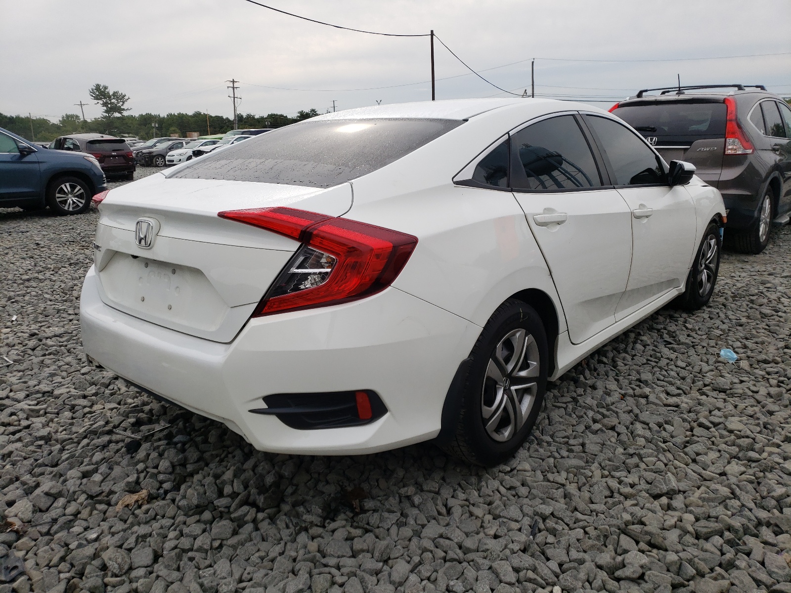 Zdjęcie 4 z aukcji – 2016 HONDA CIVIC LX z VIN 19XFC2F59GE218844