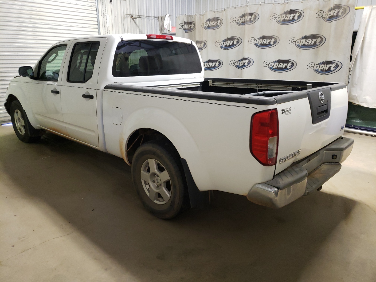 Photo 3 from auction – 2008 NISSAN FRONTIER C with VIN 1N6AD09U58C420293