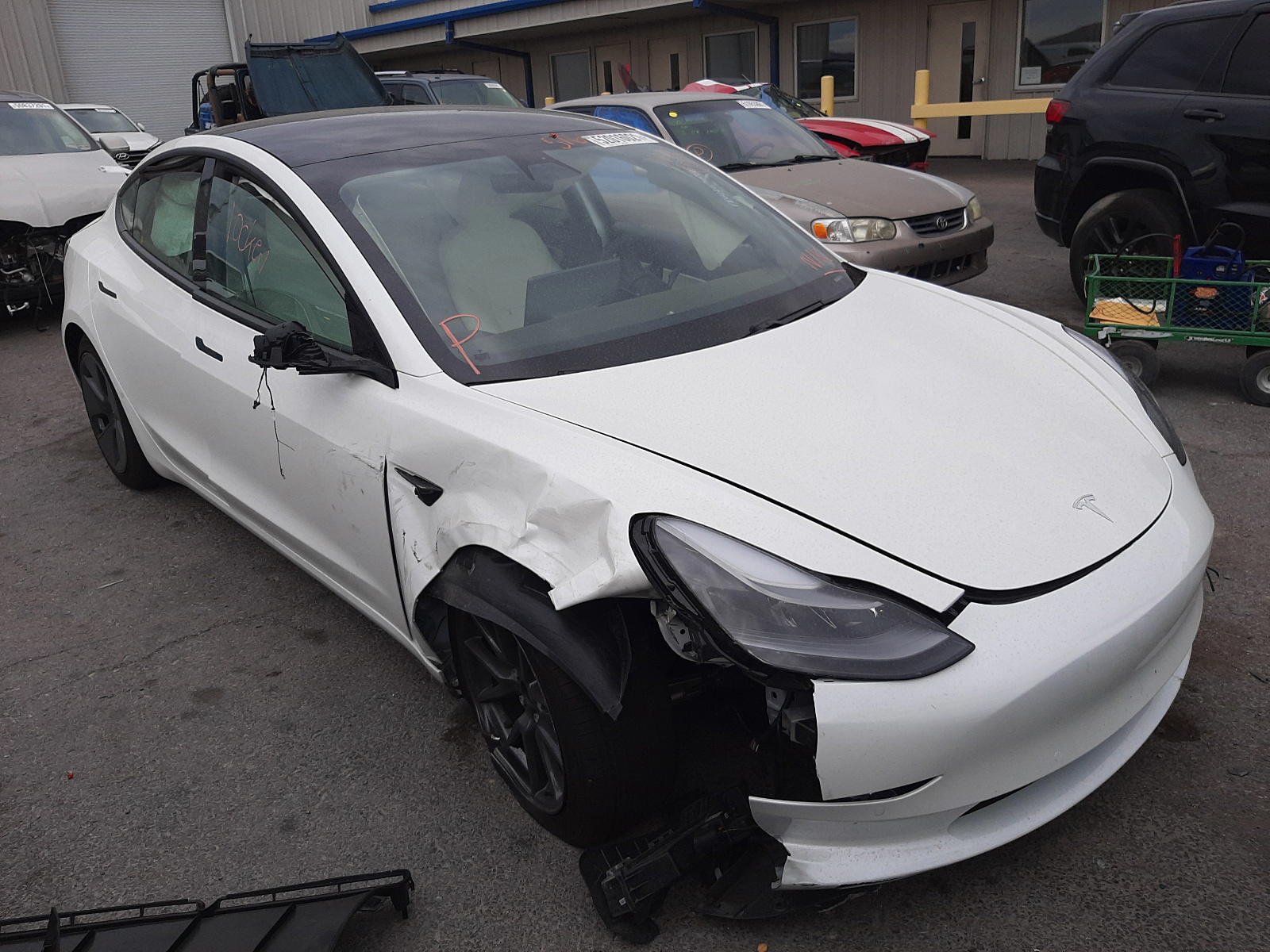 TESLA MODEL 3 2021 with VIN 5YJ3E1EA1MF921592 - Photo from auction