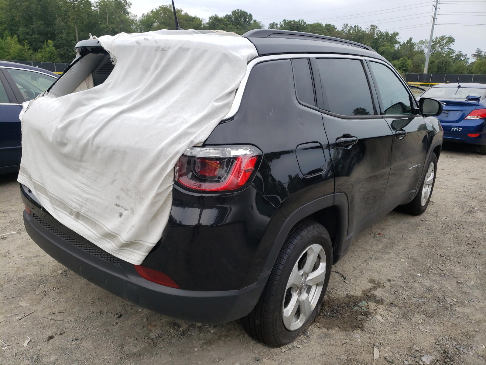 Photo 4 from auction – 2021 JEEP COMPASS LA with VIN 3C4NJCBB0MT538631