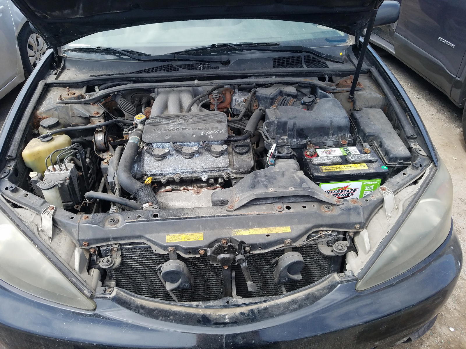 Photo 7 from auction – 2002 TOYOTA CAMRY LE with VIN JTDBF30K020039202