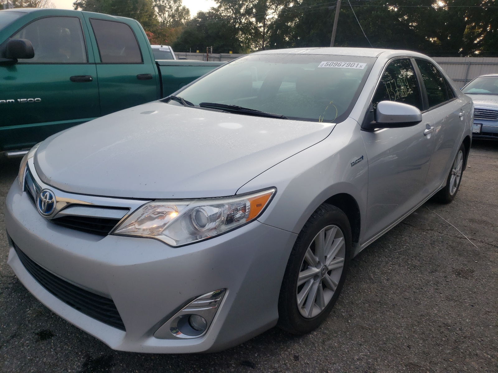 Photo 2 from auction – 2013 TOYOTA CAMRY HYBR with VIN 4T1BD1FK7DU096604