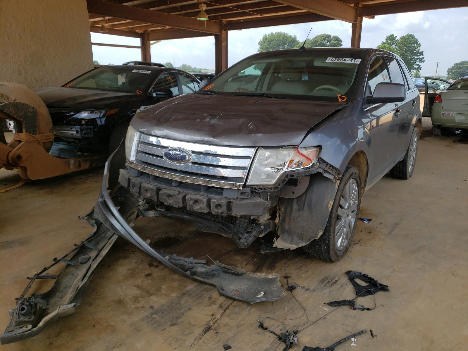 Photo 2 from auction – 2010 FORD EDGE LIMIT with VIN 2FMDK3KCXABA76244