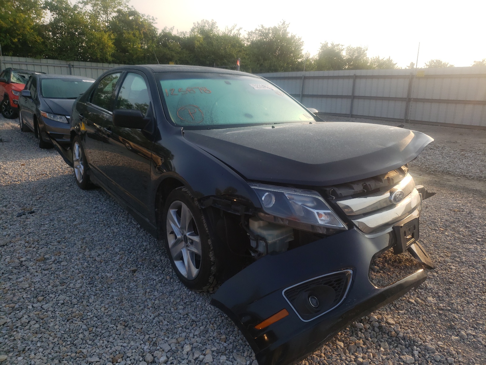 FORD FUSION SPO 2011 with VIN 3FAHP0KC3BR125878 - Photo from auction