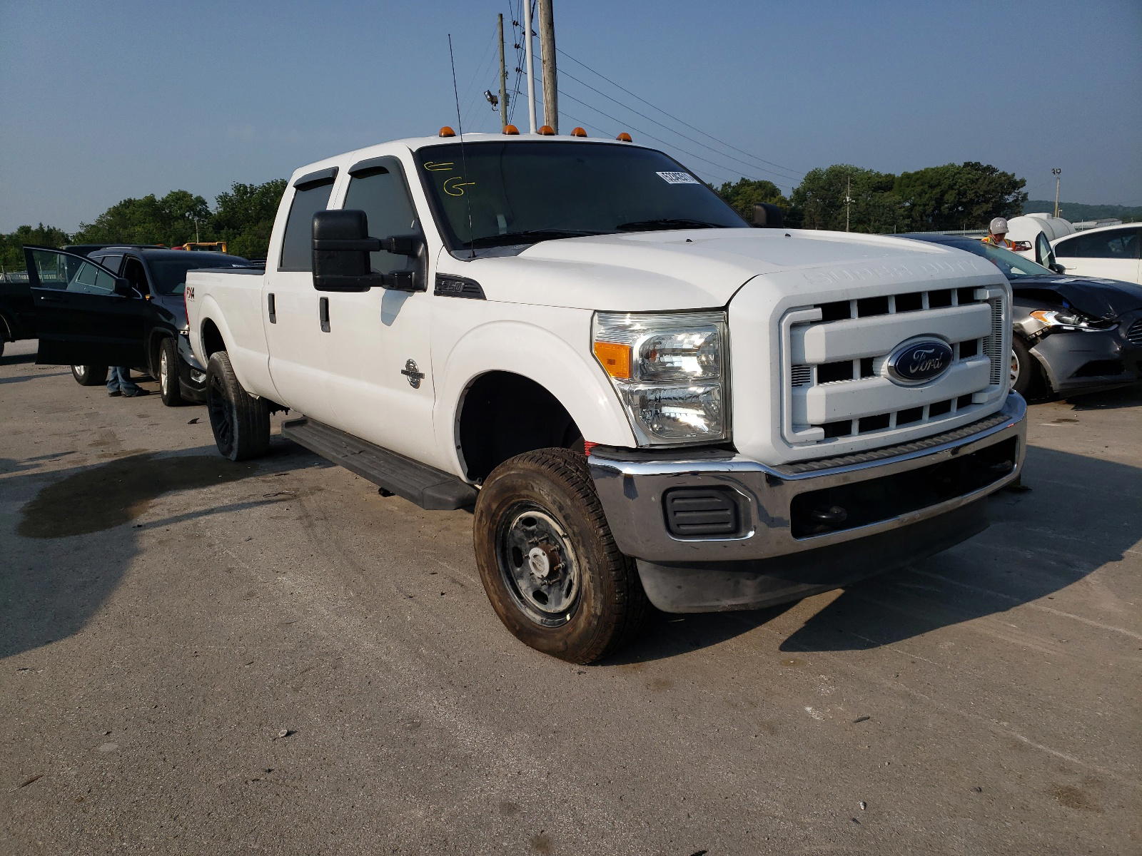 FORD F250 SUPER 2014 with VIN 1FT7W2BT4EEA89100 - Photo from auction