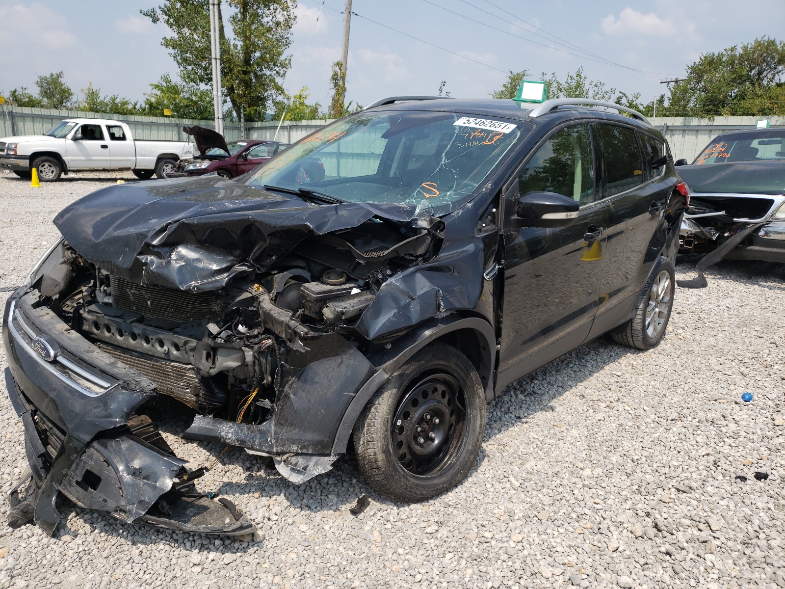Photo 2 from auction – 2015 FORD ESCAPE TIT with VIN 1FMCU0J92FUA20214