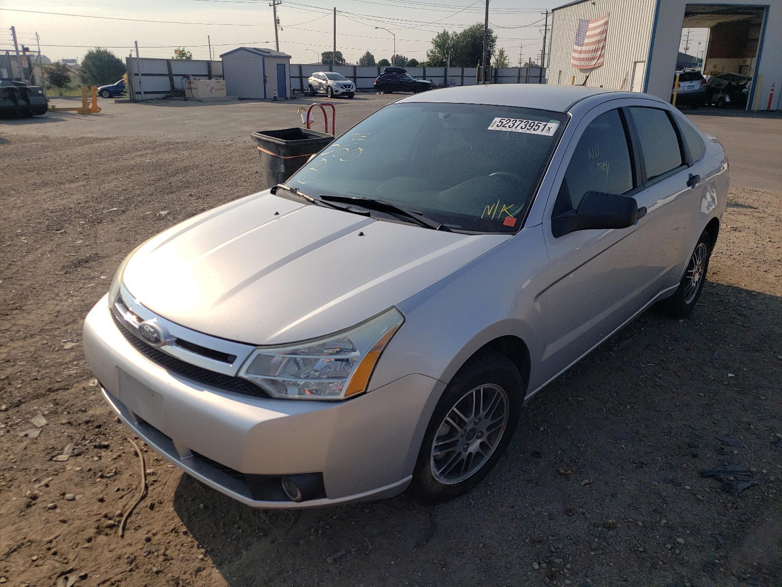 Photo 2 from auction – 2011 FORD FOCUS SE with VIN 1FAHP3FN2BW166299